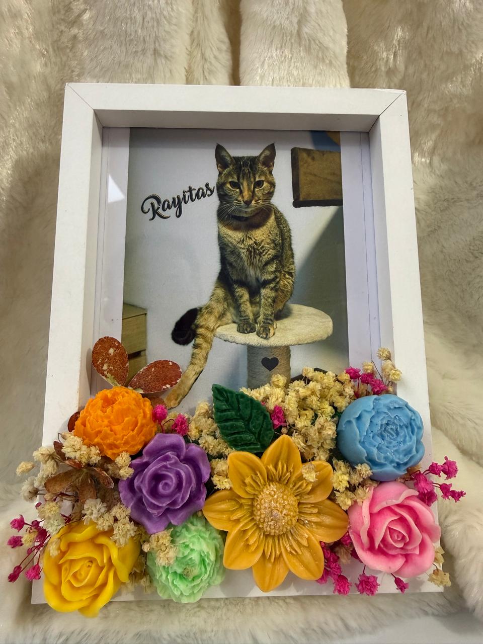 Portaretrato decorado con velas artesanales