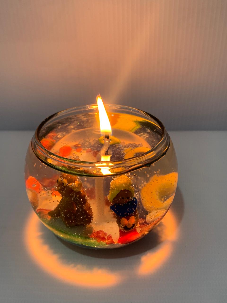 Vela líquida decorativa en pecera